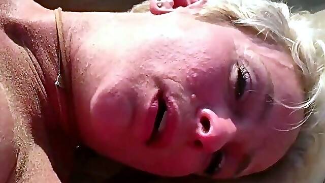 Mature Blonde Masturbating at the Beach
