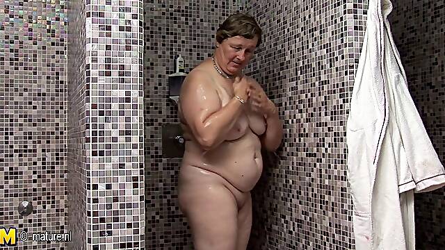 Step into a steamy paradise where mature ladies find pleasure in a sensual sauna session. Witness their seductive secrets unfold in this captivating lesbian experience.