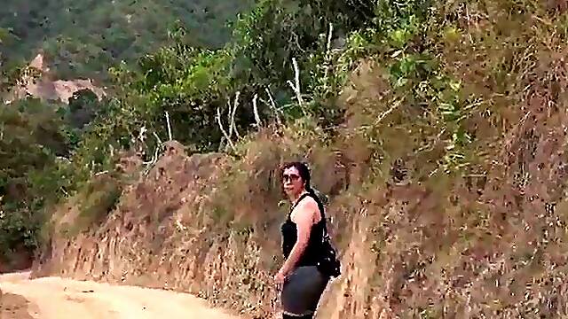 Very charming Colombian woman walking outdoors