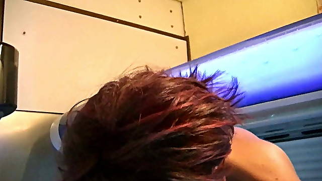 Glasses girl is pissing and gets fucked in public solarium