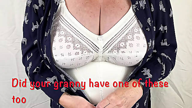 Mrs Mature Feet stripping down to her vintage Corsalette