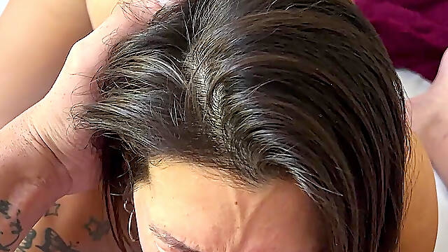 Big-titted brunette gives me a great blowjob.