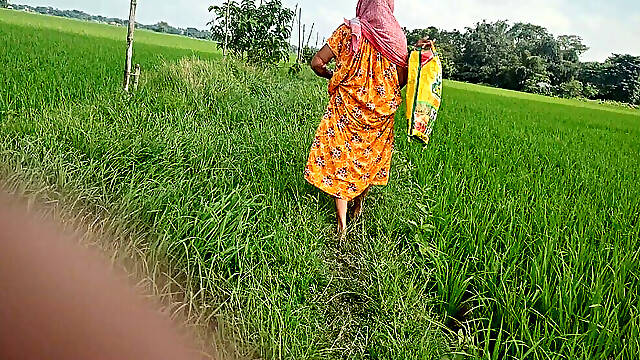 Village granny pee in the field