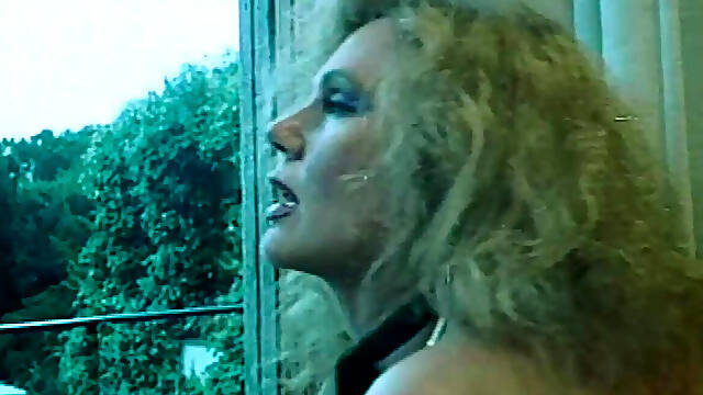Marina Lotar in 2 Vintage Scenes: a Threesome and Doggy Style with Roberto Malone.